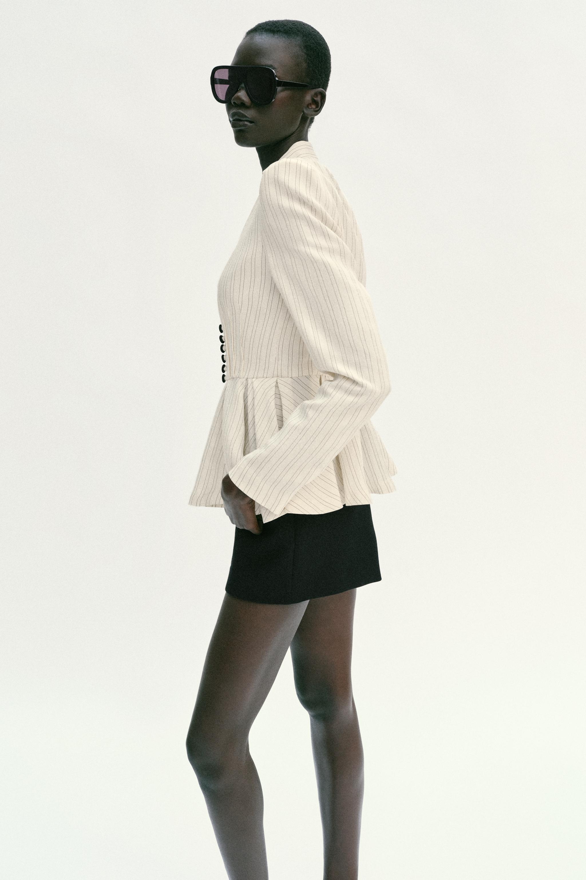 VESTE PEPLUM À RAYURES